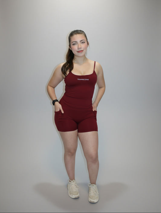 Person wearing a red outfit on a white background